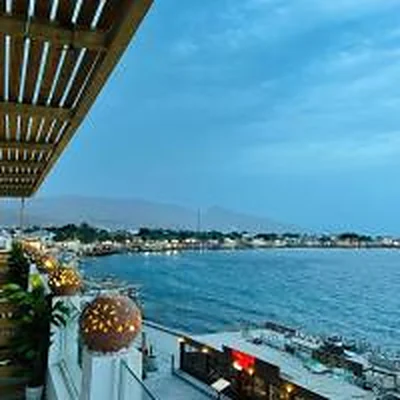The blue sea and Dahab promenade, photographed from Club Red.